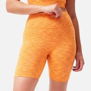 Outdoor Voices FreeForm 7” Shorts in Tangerine